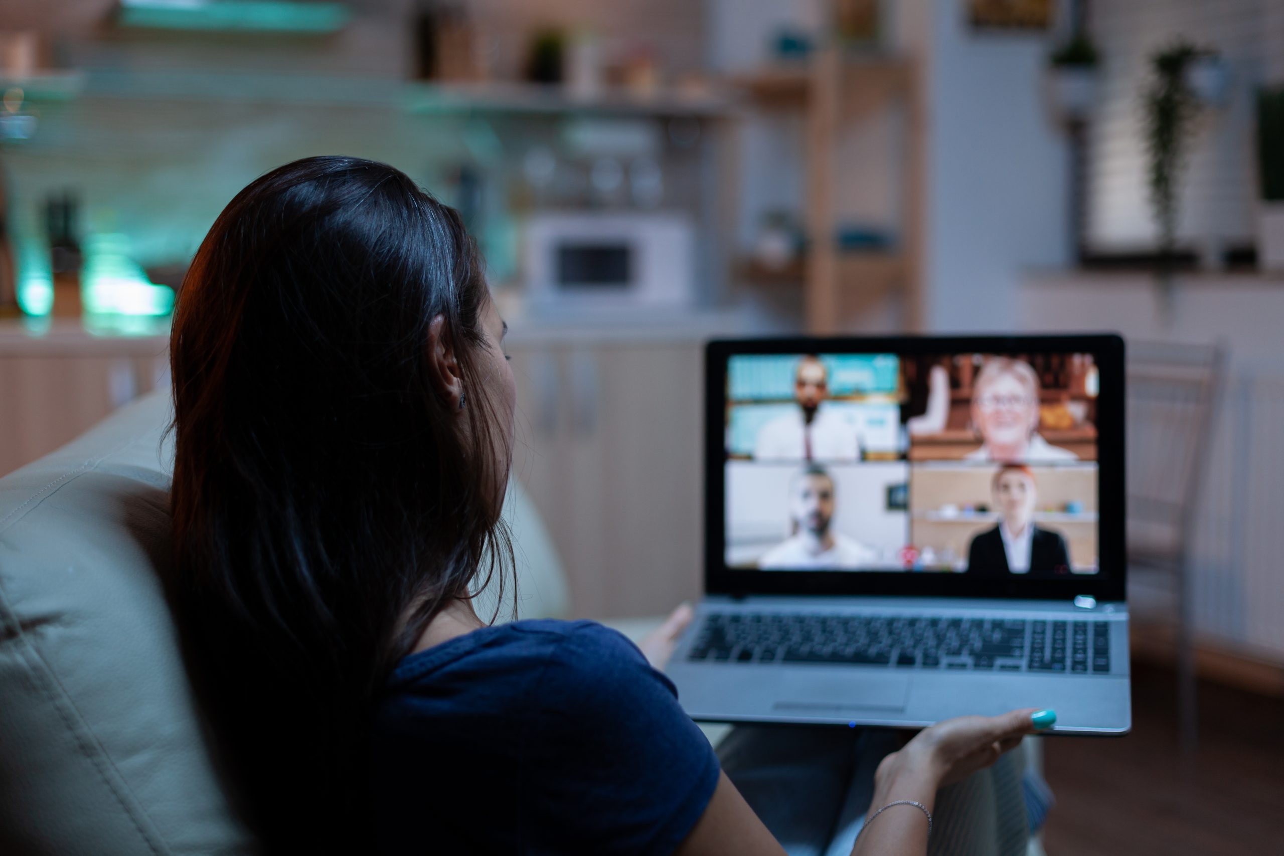 A practitioner in a live online session at home