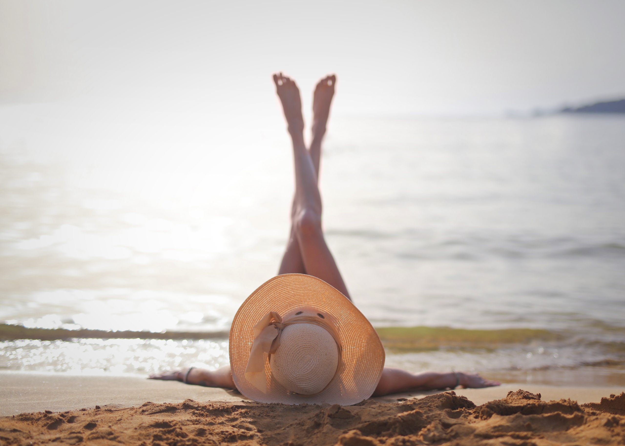 A hand reaching towards a sunrise — growth and orientation